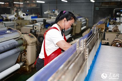 江西赣州纺织企业 出口订单激增，生产一线繁忙